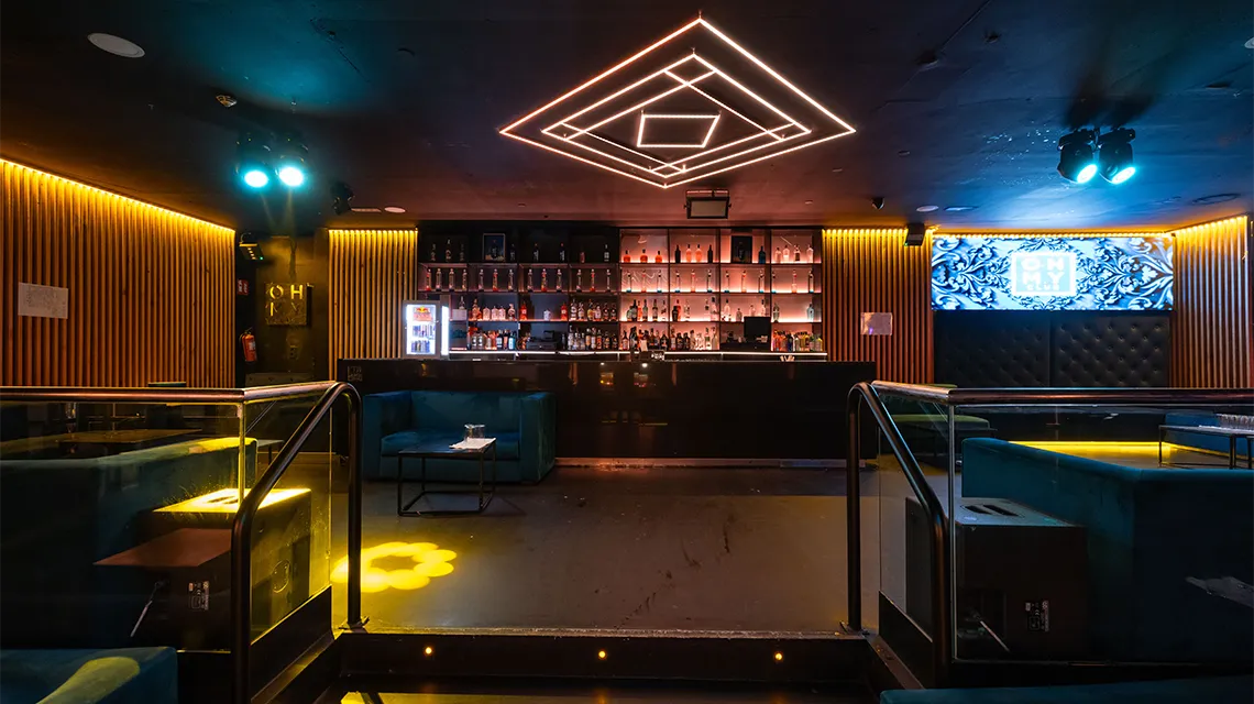 Prince room with staircase and lounge area at Oh My Club Madrid